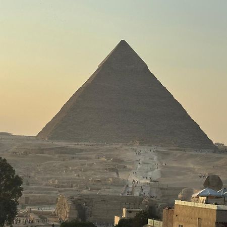 Pyramids And Sphinx Hotel Kafret el-Gabal Exterior foto