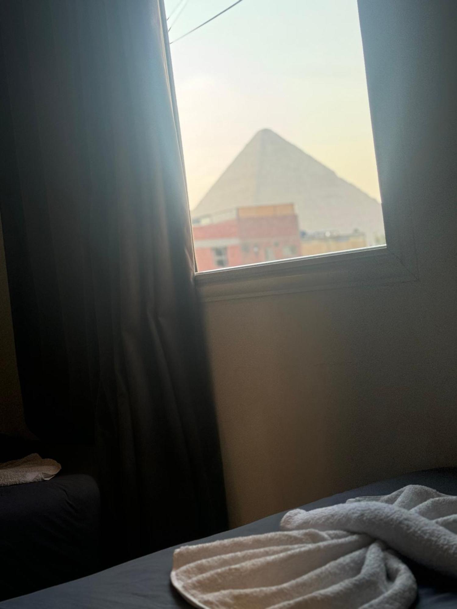 Pyramids And Sphinx Hotel Kafret el-Gabal Exterior foto